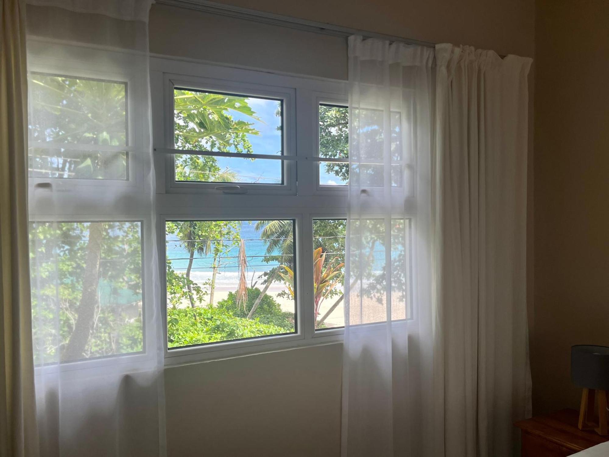 Panorama Guesthouse Apartments Beau Vallon Beach Exterior foto