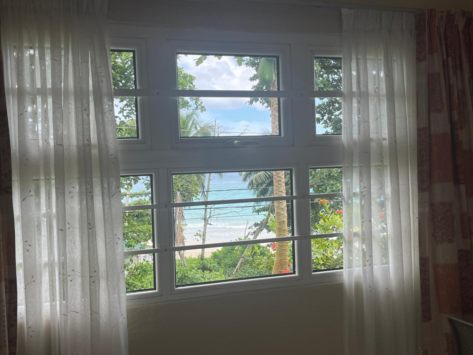 Panorama Guesthouse Apartments Beau Vallon Beach Exterior foto